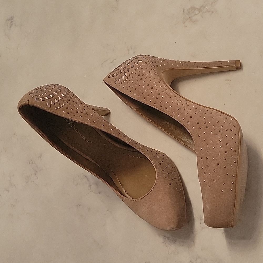 Worn once. BCBGeneration Prism pumps